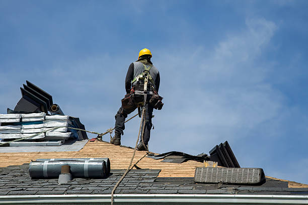 Professional Roofing technician working in Mc Connellstown, PA